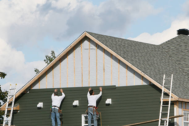 Professional Siding technician working in Alamance, NC